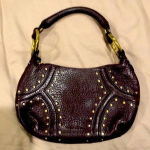 Kenneth Cole leather bag in eggplant with brass stud detailing